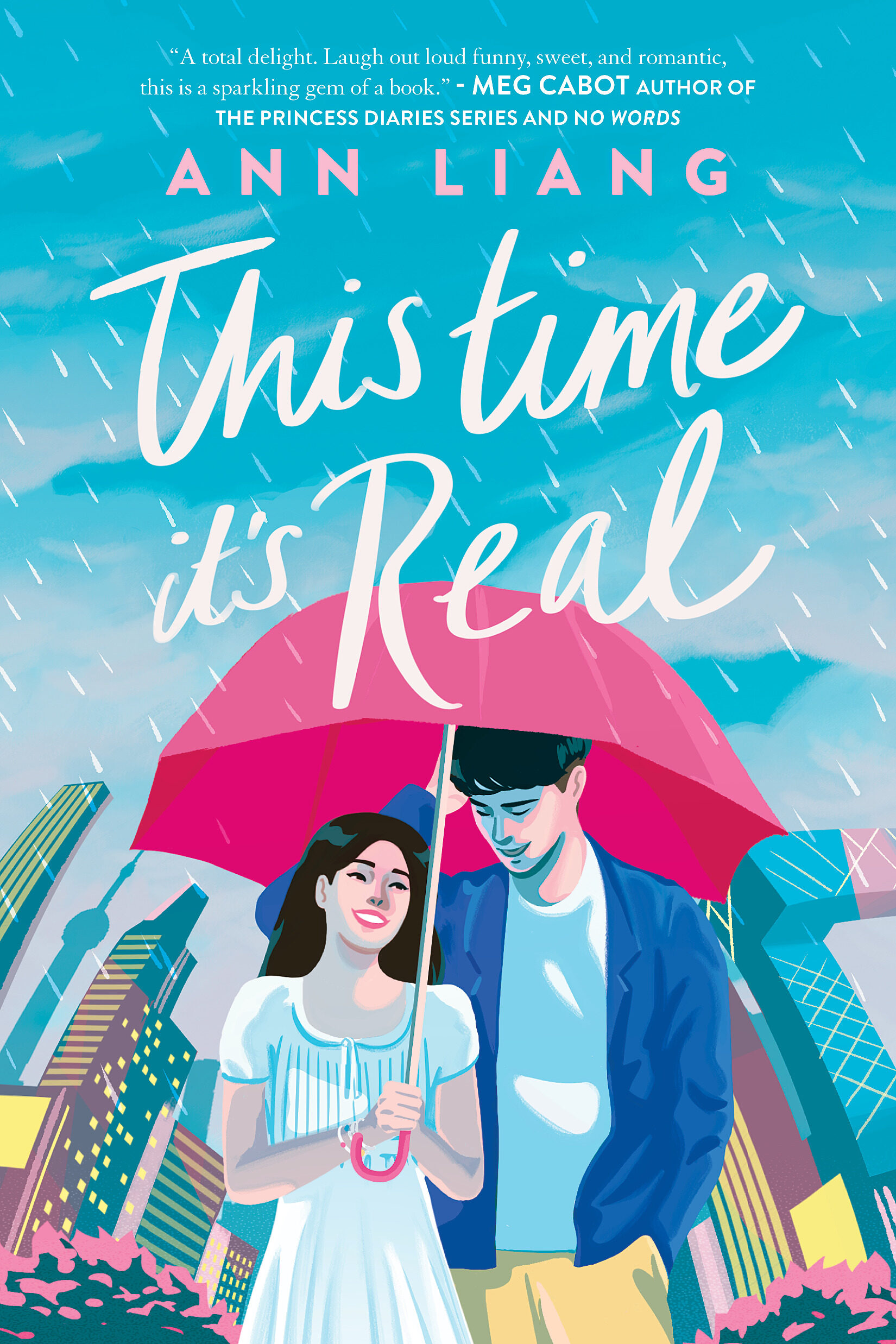 Cover of This Time It's Real by Ann Liang - picture shows a teenage girl and boy standing in the rain under a red umbrella. Skyscrapers are in the background.
